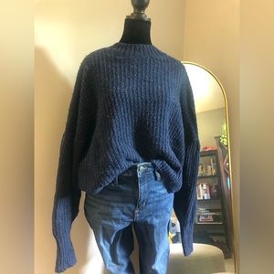 Navy blue knit mock-neck sweater